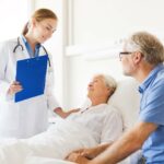 Patient in a hospital room with doctor