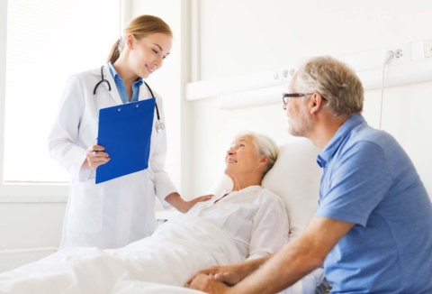 Patient in a hospital room with doctor