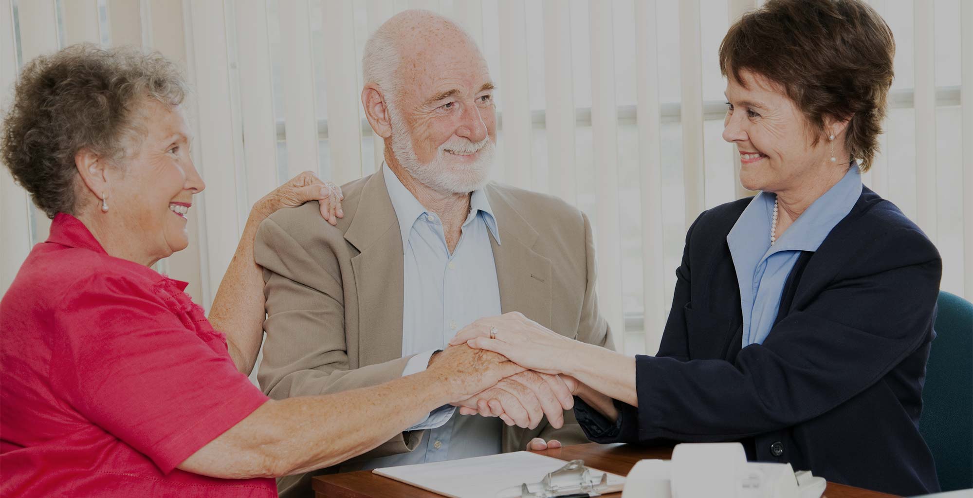 Insurance agent with old couple